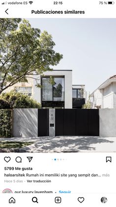 an entrance to a house with black and white architecture