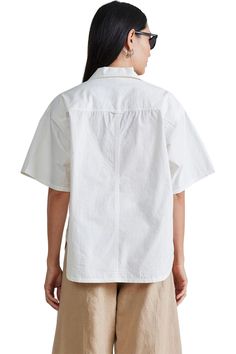 Open neckline, straight silhouette, shirttail hem, side seam slits, short sleeves that can be cuffed 100% Organic Cotton Machine wash cold on gentle cycle with like colors. lay flat to air dry Fits true to size. Select your usual size Style#: 1397WCO White Short Sleeve Tops With Rolled Sleeves, Cotton Relaxed Fit Short Sleeve Top For Work, Relaxed Fit Cotton Short Sleeve Top For Work, Relaxed Fit Cotton Short Sleeve Work Top, Effortless Short Sleeve Work Shirt, Effortless Relaxed Fit Short Sleeve Shirt, Effortless Cotton Short Sleeve Shirt, Classic Short Sleeve Blouse With Relaxed Fit, Everyday Short Sleeve Blouse With Rolled Sleeves