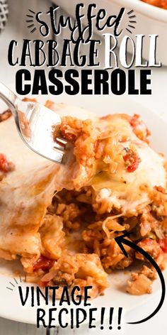 a white plate topped with lasagna casserole covered in cheese