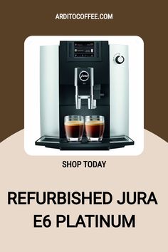 a coffee machine with two cups on it and the words refreshed jura e6