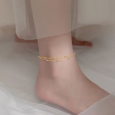 Description & Details This anklet can be worn to show off not only unique temperament but also beautiful skin. It can be worn by yourself or given as a gift.• Material: Solid 925 Sterling Silver• Finish: Hypoallergenic ∙ Gold Plating• Dimensions: 20 - 25 cm chain, adjustable• All our work is custom made by hand with love Elegant Adjustable Chain Anklet As Gift, Elegant Hypoallergenic Gold Anklets, Elegant Hypoallergenic Anklets For Summer, Minimalist Anklets For Gift, Elegant Hypoallergenic Anklets For Gifts, Adjustable Hypoallergenic Anklets, Trendy Hypoallergenic Anklets For Gifts, Anklet For Women, Wedding Charm