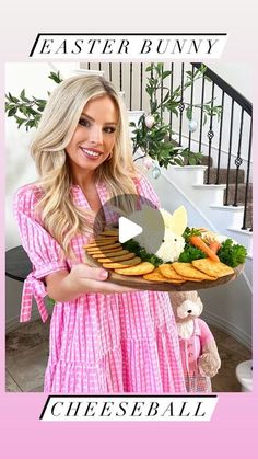 a woman holding a plate with food on it and the words easter bunny cheese ball