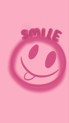 a pink smiley face with the word smile on it