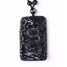 Fine or Fashion: Fine Item Type: Pendants Main Stone: OBSIDIAN Metals Type: None Certificate Type: CMA Pendants Type: SOLITAIRE Shape\pattern: Animal Style: Classic Side Stone: Other Natrual material Pendant Size: 58*36*9mm is_customized: No Main Gemstone : Natural obsidian Black Rectangular Engraved Jewelry, Black Engraved Rectangular Jewelry, Black Carved Jewelry Gift, Black Carved Symbolic Necklace, Black Rectangular Spiritual Jewelry, Adjustable Black Carved Necklace, Black Symbolic Carved Necklace, Symbolic Black Carved Necklace, Symbolic Black Pendant Necklace