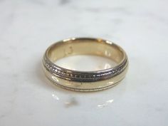 "FOR SALE IS THIS ATTRACTIVE MENS VINTAGE ESTATE 14K WHITE GOLD BAND WEDDING RING. THE TOTAL WEIGHT IS 8.8g AND IS A SIZE 10.75. THE WIDTH OF THE RING MEASURES 1/4\". RING IS MARKED 14K ON THE INSIDE OF THE BAND. ANY QUESTIONS, PLEASE DON'T HESITATE TO ASK. THIS WOULD MAKE A GREAT GIFT FOR THAT SOMEONE SPECIAL. BE SURE TO CHECK OUT SOME OF OUR OTHER GREAT ITEMS UP FOR SALE. THANK YOU. IF THERE ARE ANY ISSUES PLEASE CONTACT US, WE'RE ALWAYS HAPPY TO TRY TO HELP YOU OUT AS BEST AS WE CAN." Gold Band Wedding Ring, Band Wedding Ring, White Gold Wedding Band, White Gold Wedding Bands, White Gold Wedding, Silver Plated Jewelry, Wedding Band Ring, White Gold Band, Mens Vintage