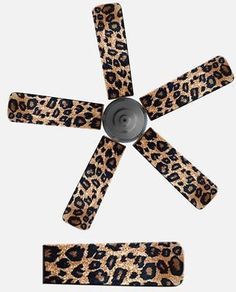 an animal print ceiling fan with four blades