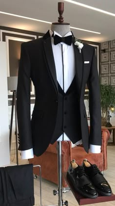 Collection: Autumn – Winter 2021/22  Product: Slim-Fit 3 Piece Suit  Color Code: Black  Size: EU46/US36 S | EU48/US38 S | EU50/US40 S | EU52/US42 S | EU54/US44 S | EU56/US46 S | EU58/US48 S  Suit Material: 70% polyester, 30% Viscose  Drop: 6  Cutting: Italian  Button: One Button  Vents: Double Vent  Machine Washable: No  Fitting: Slim-fit  Package Include: Jacket, Vest, Pants and Bow Tie Lapel Wedding, Men's Business Suits, Wedding Suits Groom, Black Shawl, Suit Material, Code Black