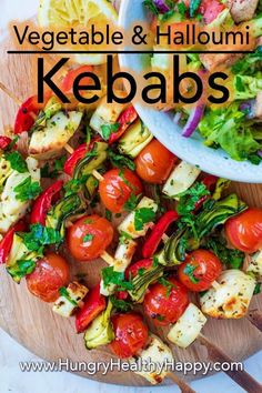 vegetables and halloumi kebabs on a cutting board with text overlay