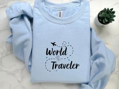 ✈️ Embark on your next adventure in style and comfort with our Traveler's Sweatshirt! 🌍 🌟 Product Details: 🌄 Crafted from ultra-soft and cozy fabric, this sweatshirt is designed to keep you snug and stylish on your journeys. ✈️ Available in a variety of sizes, ensuring the perfect fit for every globetrotter. 🌟 Features a wanderlust-inspired design that captures the essence of exploration and adventure. 🌍 High-quality printing that retains its vibrant colors, wash after wash, so you can trav