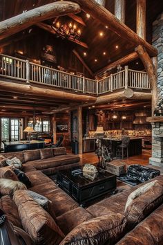 a living room filled with lots of furniture and a fire place in the middle of it