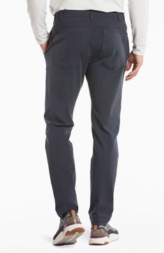 Stay comfy on or off the course in nylon performance pants built with stretch and a roomier fit that slightly tapers off at the ankle. The secure zip pocket helps safely store smaller essentials so you can keep your focus on the game. Zip fly with button closure Front slant pockets; hidden side-zip pocket; back welt pockets 88% nylon, 12% spandex Machine wash, tumble dry Imported Moisture-wicking Tapered Leg Pants With 4-way Stretch, Functional Nylon Bottoms With 4-way Stretch, Functional Straight Leg 4-way Stretch Pants, Functional Elastane Pants With Side Pockets, Functional Straight Leg Pants With 4-way Stretch, Versatile Nylon Pants With 4-way Stretch, Golf Bottoms With Pockets And 4-way Stretch, Versatile 4-way Stretch Pants With Functional Pockets, Functional Tapered Leg Pants With 4-way Stretch