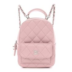 This is an authentic CHANEL Caviar Quilted CC Mini Classic Backpack in Light Pink. This stylishbackpack is beautifully crafted of light pink caviar leather. It features a rolled top handle, polished silver chain link leather threaded shoulder straps and a facing external pocket with a small silver CC logo. The top zipper opens to a pink fabric interior with leather card slots. Elegant Backpacks, Mha Dr, Chanel Top, Chanel Backpack, Stylish Backpack, Cute Birthday Outfits, Mini Classic, Chanel Mini, Light Backpack