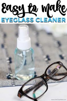 a pair of glasses sitting on top of a table next to a bottle of mouthwash