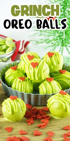 green and red candy balls in tins on a table