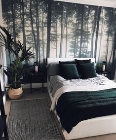 a bedroom with black and white wallpaper has a large bed in front of it