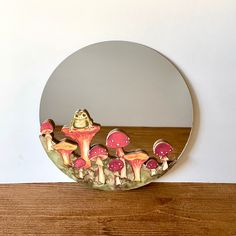 a mirror that has some mushrooms in it