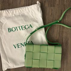 Nwt Bottega Veneta Cassette Bag In The Color Pistachio Never Worn Just Looking To Get Rid Of It Open To Offers Designer Green Crossbody Box Bag, Designer Green Pouch Box Bag, Modern Green Bag With Intrecciato Weave, Designer Green Square Bags, Green Intrecciato Weave Modern Bag, Designer Green Rectangular Box Bag, Green Square Bag With Intrecciato Weave, Green Rectangular Bags With Intrecciato Weave, Designer Green Bags With Intrecciato Weave