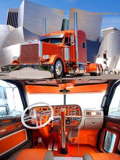 the interior of an orange truck is shown