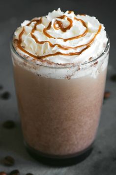 there is a drink with whipped cream on top