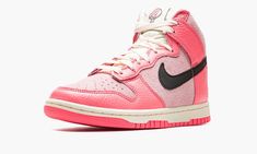 The Women’s Nike Dunk High “Hoops Pack - Pink” is a women’s version of the high-top retro basketball shoe in a colorway dedicated to its basketball heritage.  From the “Hoops Pack,” the “Pink” based Dunk High features plenty of the hue across its design.  Specifically, the shoe’s overlays are designed in pink tumbled leather while the base appears in hairy pink suede.  A black leather Swoosh is located on either side of the shoe.  Sail-colored laces match the hue of the nylon tongue.  A graphic Nike Dunk High Women, Pink Basketball, Retro Basketball Shoes, Mens Yeezy, Black Jordans, Two Fingers, Nike Dunk High, Dunk High, Pink Nikes