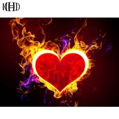 a red heart surrounded by flames on a black background