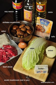 lettuce, meat and other ingredients on a cutting board