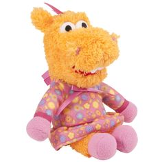 an orange stuffed animal with pink and yellow flowers on it's body, sitting in front of a white background