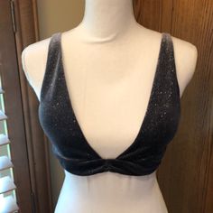 Nwot Victoria’s Secret Bralette Size Large. This Is A Fun And Comfortable Bralette With Adjustable Straps And 3 Options To Hook In Back To Make Tighter Or Looser. Fun Gray Color With Sparkles. There Is No Underwire In This Bralette. It Is Lightly Padded. There Is A Black Mark On Tag. This Is New And Never Been Worn. Seamless V-neck Crop Top For Party, Fitted Triangle Top Bra For Evening, Victoria's Secret Party Top With Built-in Bra, Victoria's Secret Tops With Built-in Bra For Party, Victoria's Secret V-neck Top For Party, Fitted Triangle Top Party Bra, Fitted Low-cut Bra For Parties, Victoria's Secret Summer Party Bra, Party Tops From Victoria's Secret, Bra Friendly