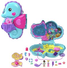 the toy playset is packed with toys such as mermaids and other things to play with