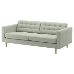 an image of a couch that is in the middle of a white background with wood legs