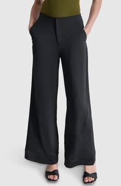 A clean waist gives way to a gracefully widened leg in staple pants that move from desk to dinner with elegant ease. Zip fly with hook-and-bar closure Front slant pockets; back welt pocket 100% polyester Dry clean or machine wash, tumble dry Imported Semi-formal Wide-leg Pants With Pockets, Tailored Sleek Wide Leg Pants, Sleek Wide Leg Pants With Pockets, Sleek High Waist Wide Leg Work Pants, Versatile Solid Color Dress Pants For Formal Occasions, Versatile Solid Color Formal Dress Pants, Sleek Wide Leg Business Casual Dress Pants, Sleek Wide Leg Business Casual Pants, Sleek Wide Leg Bottoms For Business Casual