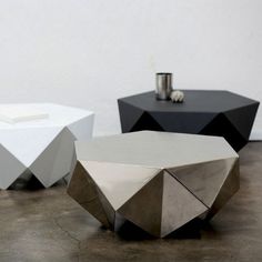 three tables with different shapes and sizes on them