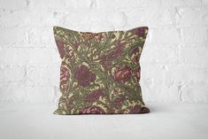 Create a luxurious atmosphere with this plum purple and moss green floral pillow cover, inspired by the timeless designs of William Morris. This rich pillow case is perfect for adding depth to your living room or bedroom and is made from high-quality materials for lasting elegance. Please note, pillow insert not included. - 100% Spun Polyester cover - Made from specially spun polyester threads, it retains it's shape, doesn't wrinkle so doesn't require ironing - Double sided print - Concealed zipper - Pillow not included Care Instructions Remove the pillows cover if it's removable. Pre-treat the stains with soft cloth or bristle brush that had been soaked in warm soap water. Machine wash, max 40oC, normal cycle. Do not bleach, do not tumble dry. Iron, steam or dry low heat only. Do not dry- Green Floral Pillow, Olive Decor, Floral Home Decor, William Morris Designs, Gold Pillows, Floral Pillow Cover, Floral Pillow, Floral Throw Pillows, Floral Pillows