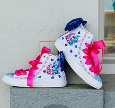 Our custom high tops are perfect to pair with our stitch tutu setr , your baby will look fabulous on her special day .  this are made to order , message me if you have any questions or if you don't see your size. PLEASE NOTE THIS LISTING IS FOR THE SHOES ONLY , OUTFIT IS SOLD SEPARATELY. NOT SURE ABOUT ARRIVING DATE ? MESSAGE US FOR CONFIRMATION OF DATE. WE CAN NO GUARANTEE ARRIVAL IF LESS THAN THREE WEEKS PRIOR TO DATE THAT YOU NEED IT BY Stitch Converse, Angel And Stitch, Girls Shoes Sneakers, Bling Shoes, High Top Sneaker, Chuck Taylors High Top, Chuck Taylor, Girls Shoes, High Top