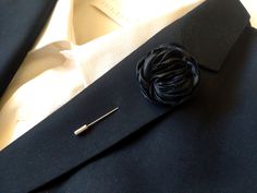 Black lapel pin Black suit brooch . This is listing for lovely Silk flower on lapel pin. Every petal of the flower is hand made by me and they are assembled together to form a very charming flower.  Elegant flower Boutonnière for special occasions. The size of the flower is about 4 cm. /1,75 inches/ .  If you want some different size of the flower, let me know and I will make a Custom order for you. You can buy 1 or set of 3,5,7 or 10.  More lapel pins: https://www.etsy.com/shop/LiLaGarden?ref=s Suit Brooch, Lapel Pins Suit, Black Boyfriend, Costume Noir, Wedding Pins, Tie Styles, Black Suit, Elegant Flowers, Silk Flower