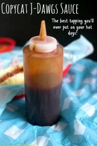 an iced drink with a straw sticking out of it's top sitting on a table