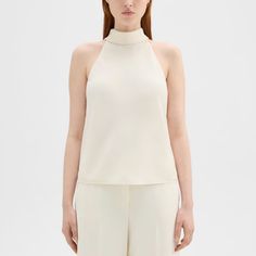 Nwt Theory Women’s Roll Neck Halter Top In Ivory Size P(0) Msrp $245 Slim Fit, Sleeveless Hip Length 100\% Polyester Pit To Pit 18”, Shoulder To Hem 23” Sleek White Top For Spring, Chic Cream Silk Top, Chic White Silk Top, Elegant Fitted Off-white Tops, Sleek White Summer Tops, Elegant Cream Sleeveless Top, Chic Cream Formal Top, Sleek White Formal Tops, Cream Sleeveless Top For Formal Occasions