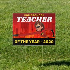 a sign in the grass that says homeschool teacher of the year - 2020