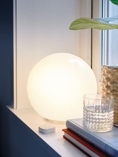 FADO Table lamp, white, 10 ". Looking for a table lamp with clean lines that can spread soft and cozy mood lighting when darkness falls? This large decorative globe in white glass is a perfect choice. Base: Polypropylene. Ikea Fado, Small Bedroom Remodel, Mood Lights, Globe Decor, Mood Light, White Table Lamp, Remodel Bedroom, Future Apartment, Kitchen Inspo