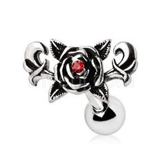 an image of a rose and cross bead charm with red crystal stone in the center