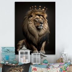 a large lion with a crown on its head sitting in front of a framed photo