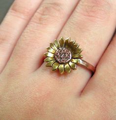 Sunflower Ring Copper and Brass Metalwork MADE TO by GarnetRoses, $34.00 Sunflower Design Floral Jewelry, Real Sunflower Jewelry, Yellow Flower Shaped Jewelry With Sunflower Print, Sunflower Jewelry Inspire Uplift ⭐, Yellow Flower-shaped Jewelry With Sunflower Print, Sunflower Ring, Copper Rings, Copper And Brass, Mixed Metals