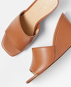 Elevate your style with the Ann Taylor Leather Strappy High Wedge Sandals, a perfect blend of elegance and comfort. 

- Size: 8
- Color: Midnight Mahogany
- Material: 100% Leather
- Gender: Female
- Heel Height: 3 1/4 inches
- Features: Open toe, padded footbed

These sandals feature a luxurious leather construction in a rich midnight mahogany shade, designed to complement any outfit. The strappy design adds a touch of sophistication, while the padded footbed ensures comfort all day long. Ideal Modern Brown Wedge Sandals, Brown Wedge Heel Sandals With Padded Heel, Classic Closed Toe Wedge Sandals For Summer, Brown Wedge Sandals With Padded Heel, Modern Brown Wedge Sandals With Open Heel, Modern Brown Wedge Sandals For Spring, Modern Brown Open Heel Wedge Sandals, Classic Leather Wedge Sandals For Summer, Classic Brown Wedge Heel Sandals