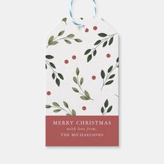 a christmas gift tag with red berries and green leaves