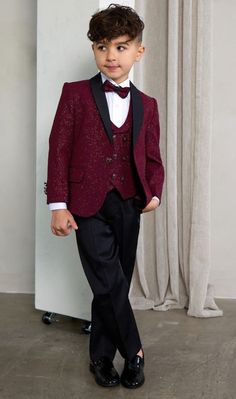 5 Piece Fashion Sequin Tuxedo Set dapper your little gentleman right up! This look is smoother than sequins with its glitter finish.  Talk about wanting to be the star of the occasion, or even just a little bling bling. Boy's 5-Piece Fashion Sequin Tuxedo Set consists of a high quality jacket, a double breasted vest, pants, shirt and bowtie.  Peak Lapel Jacket offers side vents for ventilation and comfort. Comes with matching pants. Pants need to be hemmed/tailored to match his height.  Modern S Classic Fitted Festive Sets, Elegant Party Sets With Bow Tie, Fitted Wedding Suit With Bow Tie, Classic Formal Sets With Bow Tie, Elegant Sets With Bow Tie For Wedding, Fitted Party Tuxedo With Bow Tie, Elegant Wedding Sets With Bow Tie, Classic Suits With Bow Tie For Party, Fitted Tuxedo Bow Tie For Groom