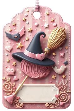 a pink card with a witch hat and broom