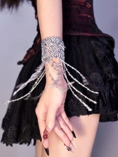 Enhance your cyberpunk look with our stunning cyberpunk silver gothic tassels beads stretch bracelet. This edgy and versatile bracelet features intricate tassels and beads, adding a touch of gothic flair to any outfit. Whether you're attending a music festival or a night out with friends, this stretch bracelet is the perfect accessory to make a bold fashion statement.  Please note that this product includes only one bracelet.  Garment Size   	 		 			Size 			Free Size 		 		 			Adjustable Circumfe Gothic Style Adjustable Silver Wristband, Gothic Adjustable Bracelets For Alternative Fashion, Adjustable Metal Punk Bracelets, Gothic Style Metal Bracelet, Gothic Adjustable Bracelet, Cyberpunk Look, Mesh Gloves, Steampunk Heart, Punk Accessories