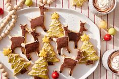 christmas cookies decorated with icing on a plate