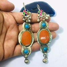 I am Offer you This Vintage Afghan Turkoman Traditional Wedding Party Belly Dance alpaka Tassels Hande-Crafted Workmanship Ethnic Tribal Kuchi alpaka Earrings. Its %100 hand crafted workmanship with Beautiful with Carnelian & Turquoise Beads stones and lovely colorful Shape.Measures, Length : Inches 4.4" ( 11.3 cm ). Width : Inches 0.9" ( 2.5 cm). The pair Weight : 19.4 grams, For More informations about This item Please Contact me Thank youwith My Best Wishes Shiping: Package will be sent withi Traditional Tassel Earrings For Party, Traditional Tassel Earrings For Festive Occasions, Traditional Multicolor Danglers For Festival, Bohemian Danglers With Latkans For Festive Occasions, Bohemian Danglers For Festivals, Bohemian Red Danglers For Celebration, Red Bohemian Danglers For Celebration, Bohemian Danglers For Weddings And Festivals, Bohemian Wedding Danglers With Latkans