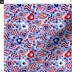 an american flag pattern with hearts and paw prints on blue fabric, as well as red white and blue stars